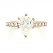 1.83 ctw. Pear Cut Diamond Engagement Ring in a French Pave Setting