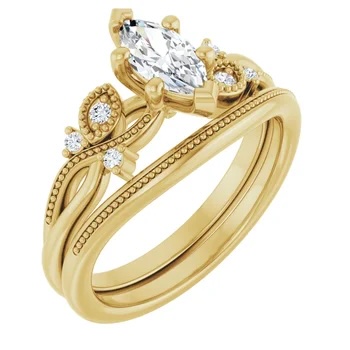 2.00ct marquis cut Lab Grown Diamond set in a Accented 14kt yellow Gold Setting with a matching band